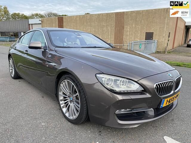 Bruin Gebruikt 2013 BMW 640 Executive Coupé | € 13.999 - Afbeelding 1/4