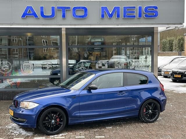 Blauw Occasion 2009 BMW 118 Hatchback | € 4.495 (Eerlijke prijs) - Afbeelding 1/4