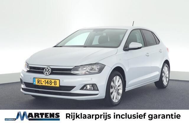 Wit, metallic lak Gebruikt 2018 VW Polo Comfortline Hatchback | € 11.949 (Eerlijke prijs) - Afbeelding 1/4