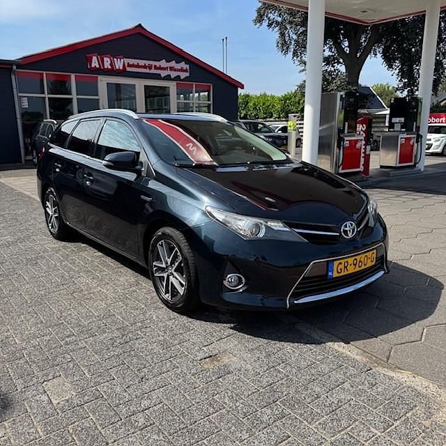 Zwart Gebruikt 2015 Toyota Auris Hybrid Stationwagen | € 9.450 (Super prijs) - Afbeelding 1/4