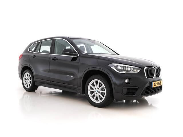 Schwarz uni Gebruikt 2016 BMW X1 Executive SUV | € 13.445 - Afbeelding 1/4