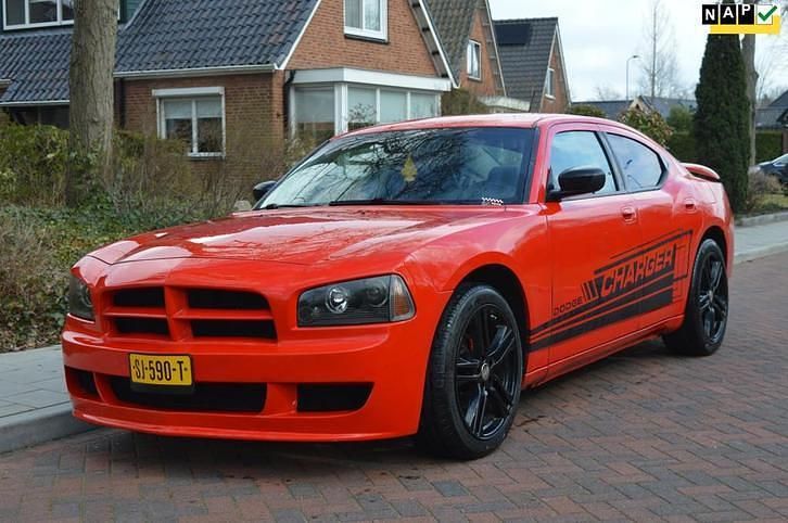 Rood, metallic lak Gebruikt 2008 Dodge Charger SXT Sedan | € 10.995 - Afbeelding 1/4