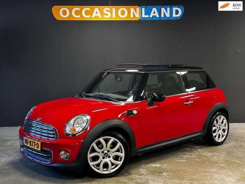 Rood, metallic lak Gebruikt 2010 Mini Cooper Chili Hatchback | € 7.750 (Iets duurder) - Afbeelding 1/4