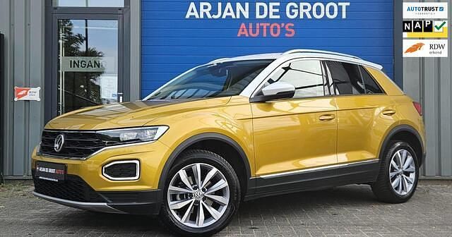 Geel (metallic) Gebruikt 2019 VW T-Roc SUV | € 21.950 (Goede deal) - Afbeelding 1/4