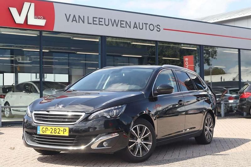 Zwart Gebruikt 2015 Peugeot 308 Premium Stationwagen | € 3.748 (Super prijs) - Afbeelding 1/4