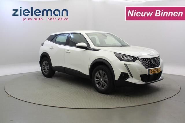 Wit, metallic lak Gebruikt 2020 Peugeot e-2008 Active SUV | € 15.845 (Iets duurder) - Afbeelding 1/4