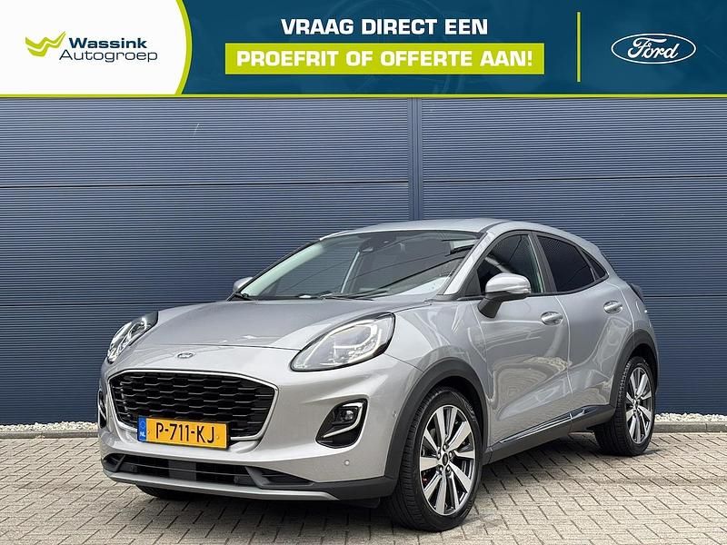Grijs (metallic) Gebruikt 2022 Ford Puma Titanium X SUV | € 19.900 - Afbeelding 1/4