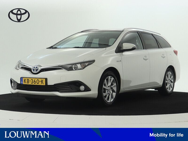 Wit Gebruikt 2016 Toyota Auris Hybrid Trend Hatchback | € 16.445 (Iets duurder) - Afbeelding 1/3
