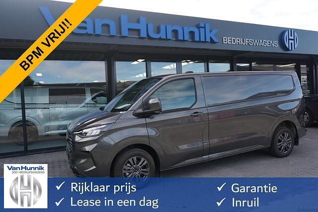 Grijs Gebruikt 2024 Ford Transit Custom Limited Van | € 36.850 (Eerlijke prijs) - Afbeelding 1/4