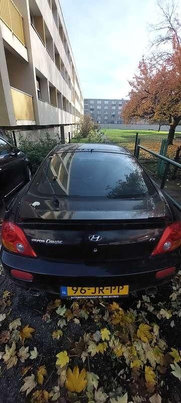 Zwart Gebruikt 2002 Hyundai Coupé Coupé | € 950 - Afbeelding 1/4