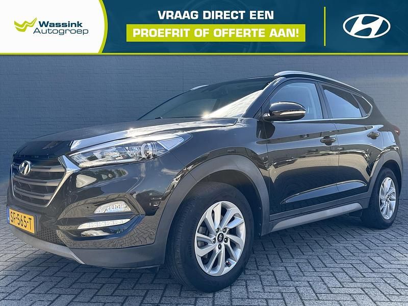 Zwart Gebruikt 2018 Hyundai Tucson Comfort SUV | € 19.940 (Eerlijke prijs) - Afbeelding 1/4