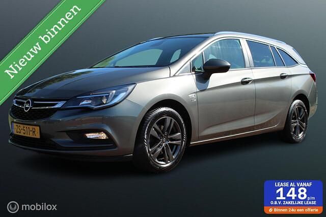 Grijs Gebruikt 2019 Opel Astra Edition Stationwagen | € 9.895 (Goede deal) - Afbeelding 1/4