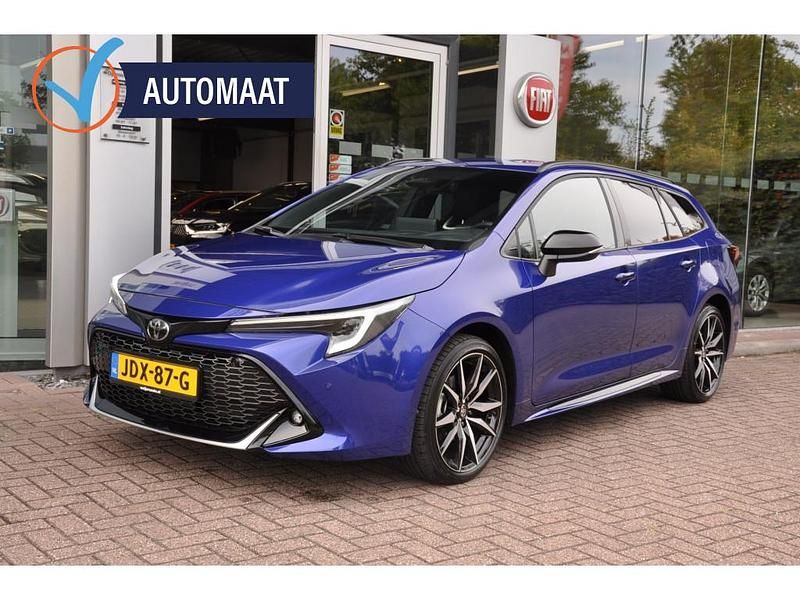 Blauw Gebruikt 2024 Toyota Corolla Hybrid Sport Stationwagen | € 32.900 - Afbeelding 1/4
