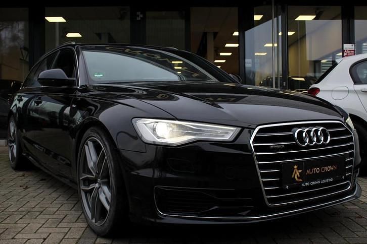 Zwart Gebruikt 2016 Audi A6 S-Line Stationwagen | € 17.900 - Afbeelding 1/4