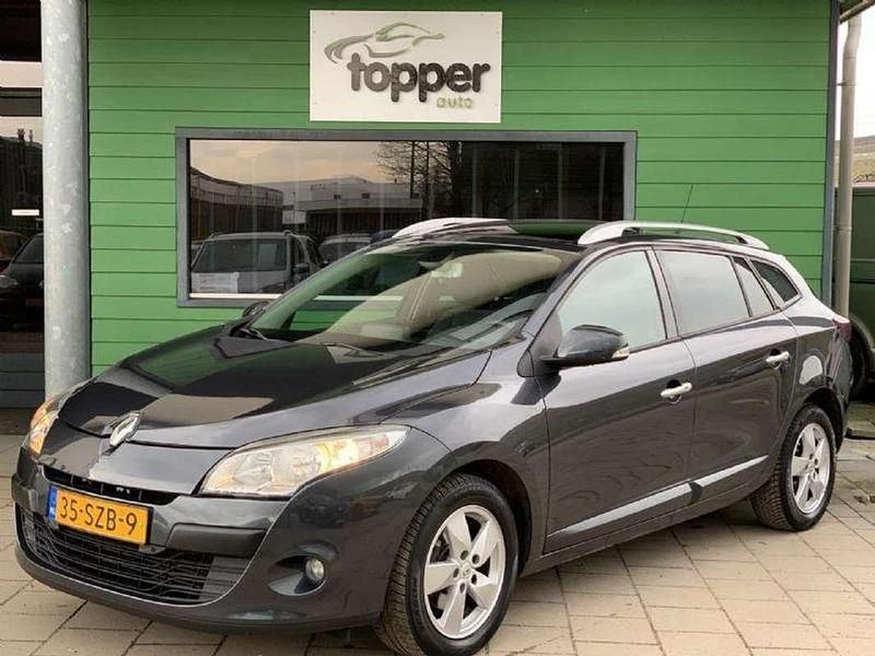 Grijs Gebruikt 2012 Renault Mégane GrandTour Dynamique Stationwagen | € 5.445 (Eerlijke prijs) - Afbeelding 1/4