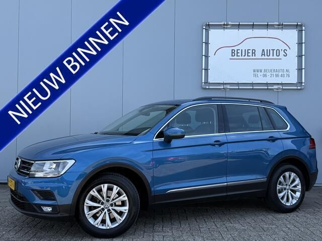 Blauw, metallic lak Gebruikt 2017 VW Tiguan Comfortline SUV | € 18.395 (Eerlijke prijs) - Afbeelding 1/4