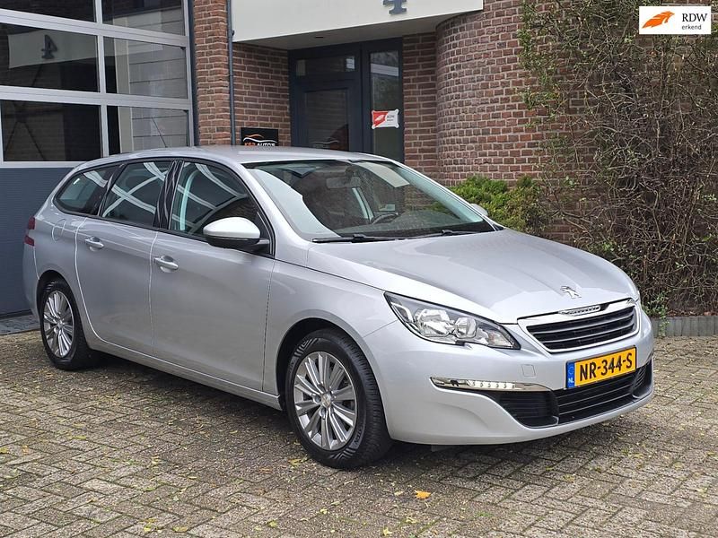 Grijs Gebruikt 2017 Peugeot 308 Stationwagen | € 6.495 (Goede deal) - Afbeelding 1/4