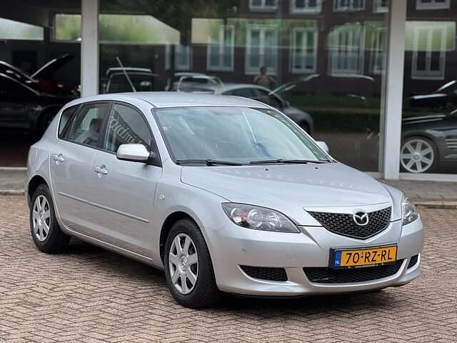 Grijs Gebruikt 2005 Mazda 3 Inclusive Hatchback | € 2.990 (Iets duurder) - Afbeelding 1/4
