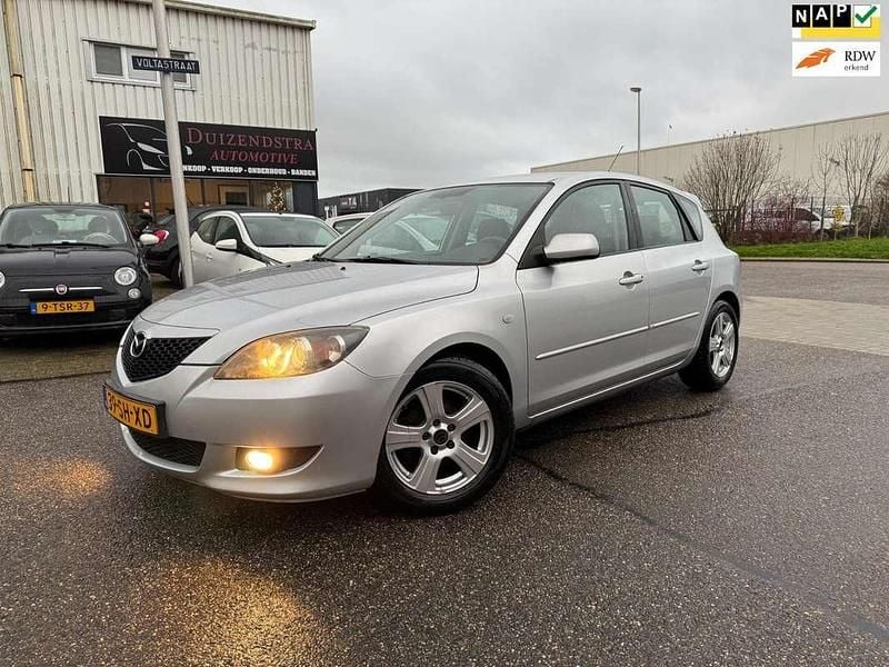 Grijs Gebruikt 2006 Mazda 3 Inclusive Hatchback | € 4.450 (Eerlijke prijs) - Afbeelding 1/4