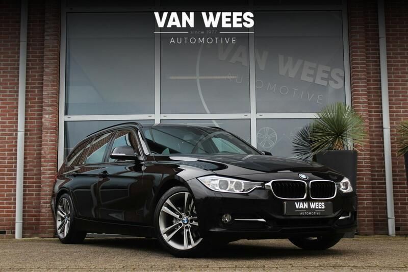 Zwart, metallic lak Gebruikt 2013 BMW 320 Executive Stationwagen | € 13.950 (Iets duurder) - Afbeelding 1/3