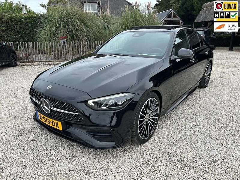 Zwart Gebruikt 2022 Mercedes C180 AMG Sedan | € 35.950 (Goede deal) - Afbeelding 1/4