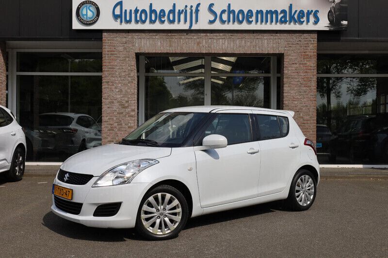 Wit, metallic lak Gebruikt 2014 Suzuki Swift Hatchback | € 8.995 (Eerlijke prijs) - Afbeelding 1/4