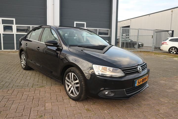 Zwart Gebruikt 2011 VW Jetta Highline Sedan | € 4.950 (Eerlijke prijs) - Afbeelding 1/4