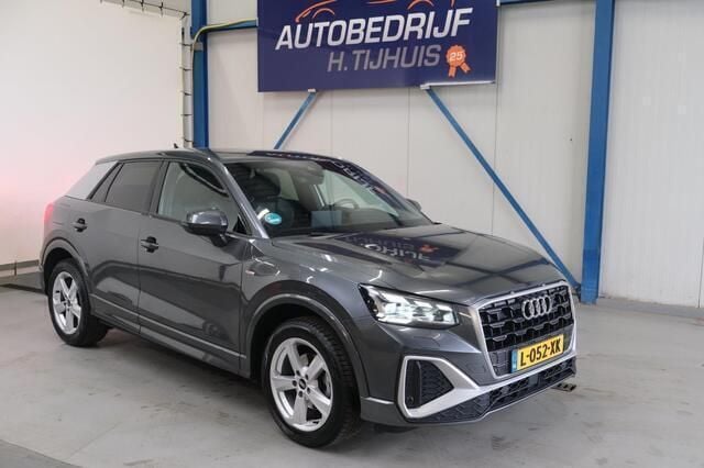 Grijs Gebruikt 2021 Audi Q2 S-Line SUV | € 19.250 (Goede deal) - Afbeelding 1/4