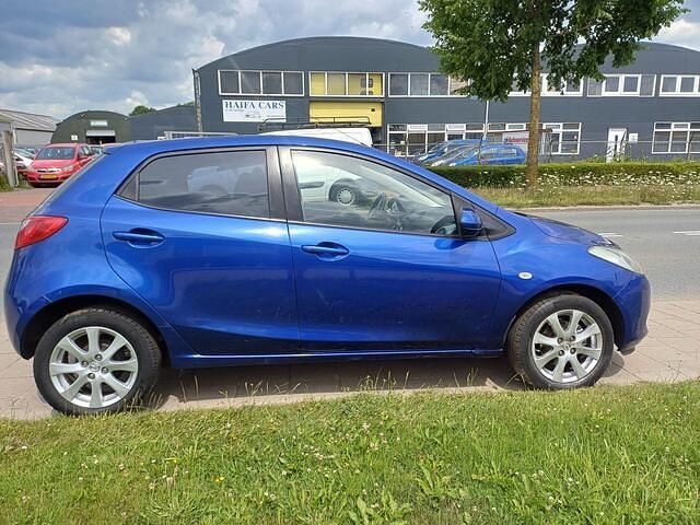 Blauw Gebruikt 2009 Mazda 2 Touring Hatchback | € 3.950 (Eerlijke prijs) - Afbeelding 1/4
