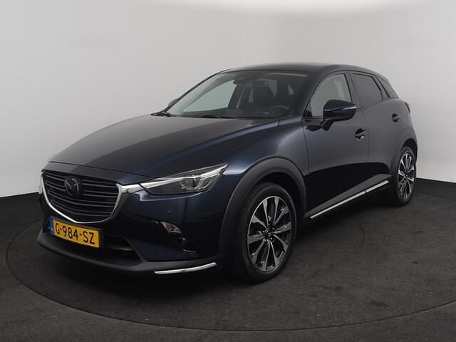 Deep crystal blue (blauw metallic) Gebruikt 2019 Mazda CX-3 SUV | € 19.940 (Eerlijke prijs) - Afbeelding 1/4
