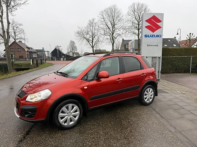 Oranje Occasion 2013 Suzuki SX4 Comfort MPV | € 7.350 (Eerlijke prijs) - Afbeelding 1/4