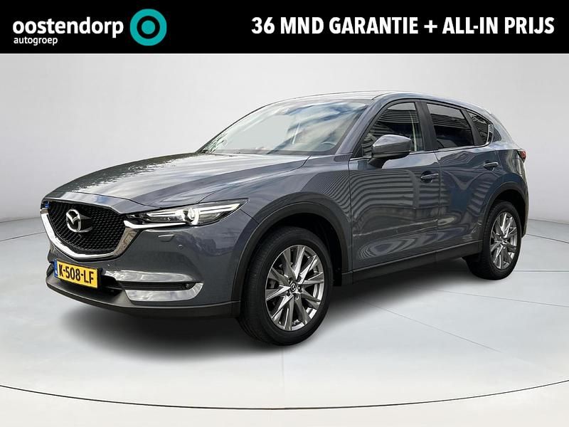 Polymetal gray Gebruikt 2021 Mazda CX-5 Style SUV | € 32.900 (Eerlijke prijs) - Afbeelding 1/4
