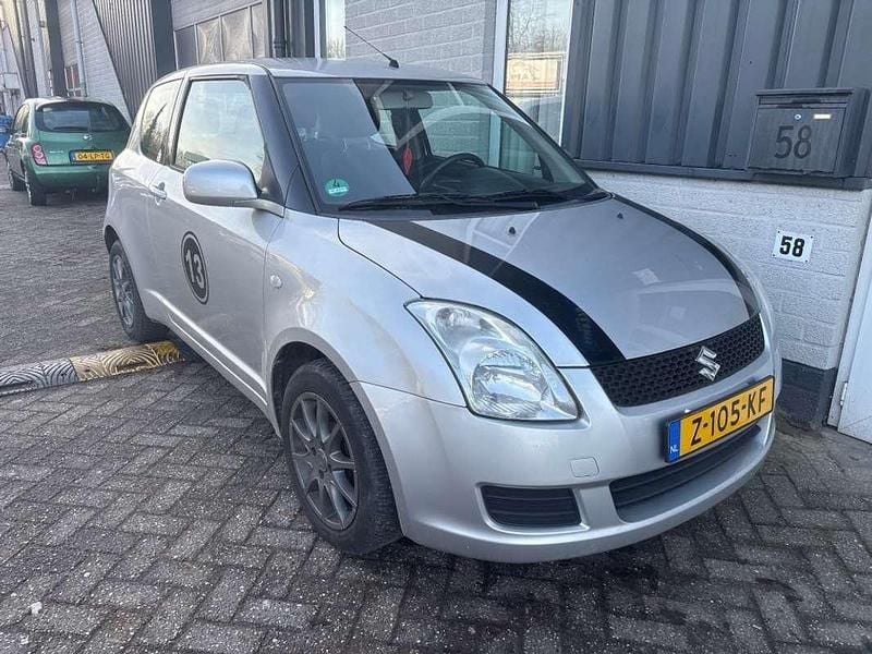 Grijs Occasion 2009 Suzuki Swift Exclusive Hatchback | € 1.995 (Goede deal) - Afbeelding 1/4