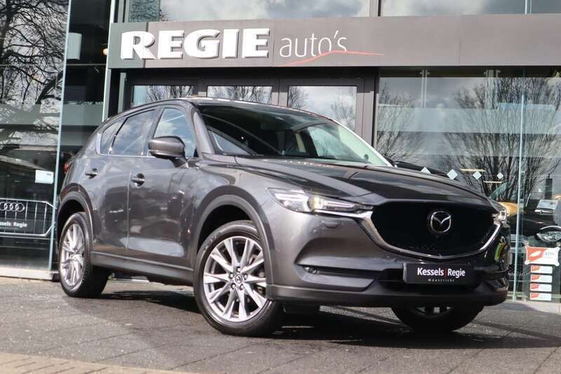 Grijs, metallic lak Gebruikt 2020 Mazda CX-5 Signature SUV | € 28.450 (Goede deal) - Afbeelding 1/4