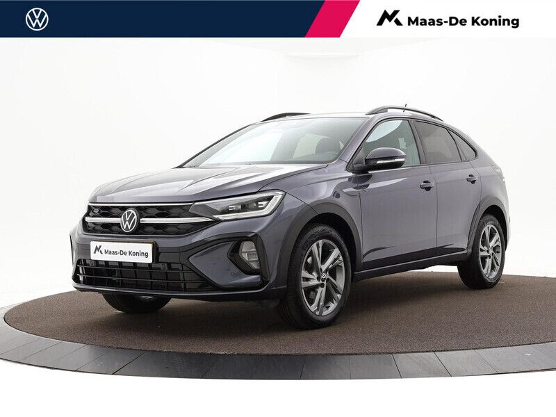 Grijs Gebruikt 2024 VW Taigo R-line SUV | € 28.940 - Afbeelding 1/3