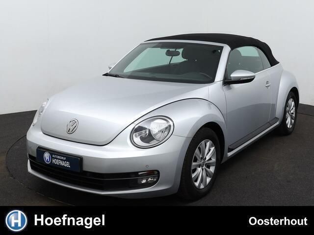 Grijs, metallic lak Gebruikt 2014 VW Beetle Design Cabriolet | € 13.450 (Eerlijke prijs) - Afbeelding 1/4