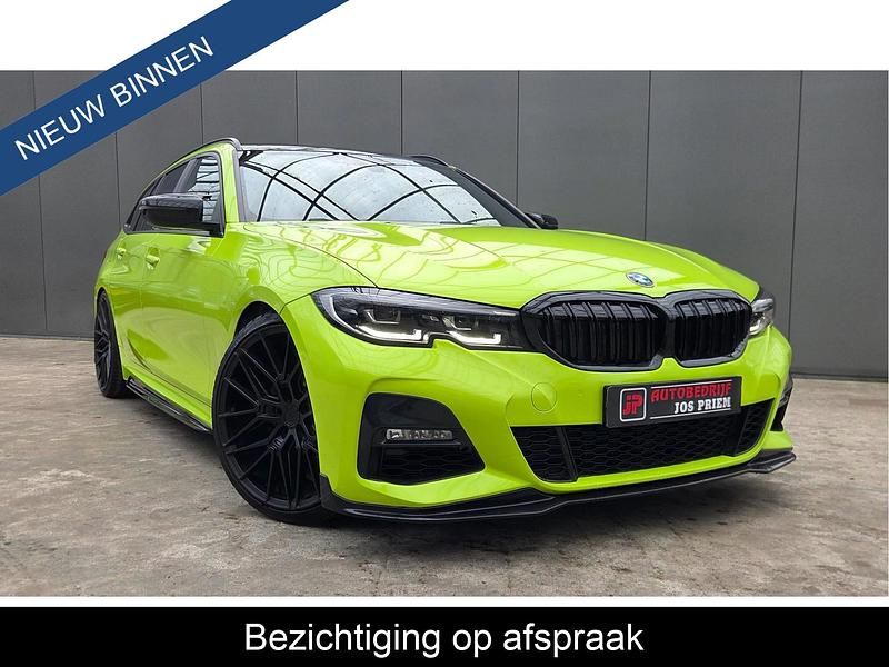 Blauw Occasion 2021 BMW 318 M Performance Stationwagen | € 27.950 - Afbeelding 1/4