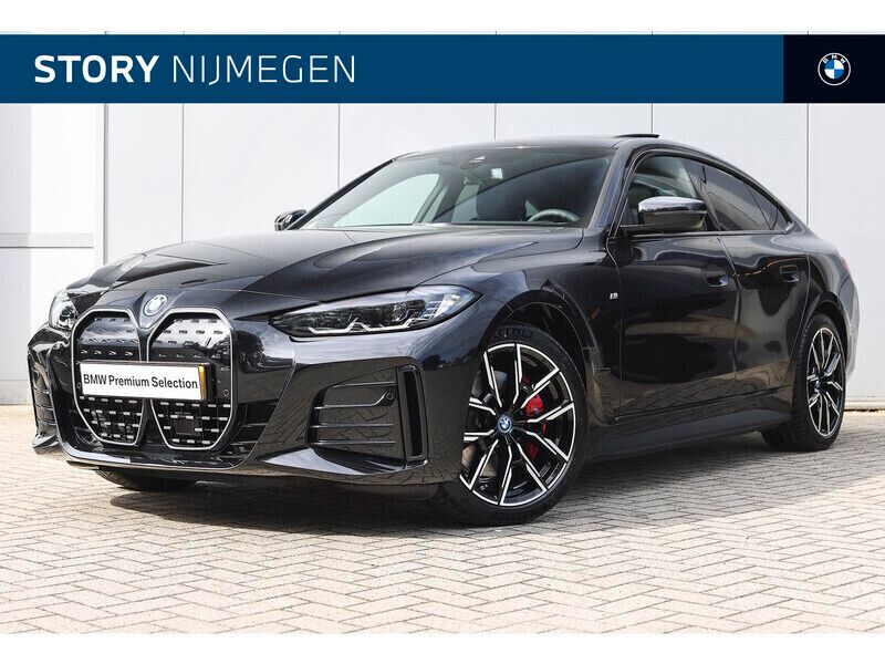 Saphirschwarz Gebruikt 2024 BMW i4 Executive Sedan | € 49.950 (Goede deal) - Afbeelding 1/4