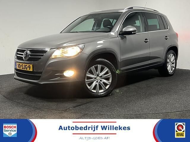 Grijs Occasion 2012 VW Tiguan Sport SUV | € 7.650 (Eerlijke prijs) - Afbeelding 1/4