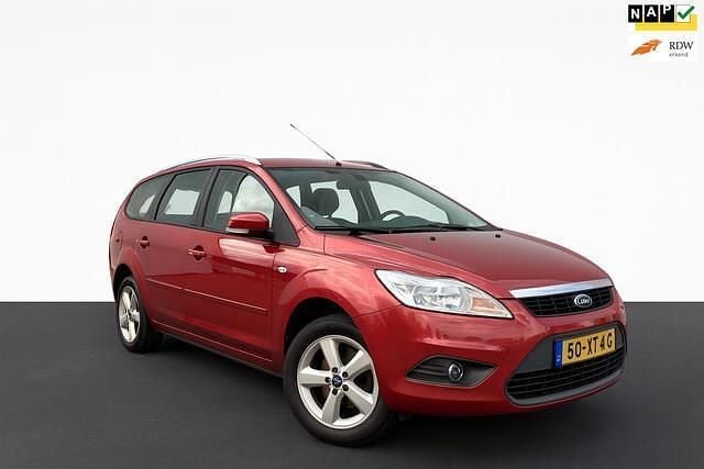 Oranje Gebruikt 2007 Ford Focus Futura Stationwagen | € 1.750 (Eerlijke prijs) - Afbeelding 1/4