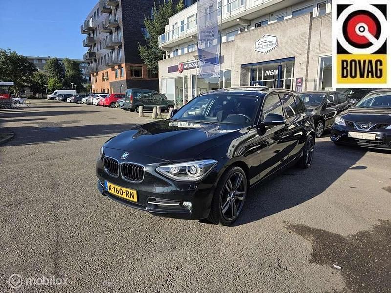 Zwart Gebruikt 2013 BMW 116 Sport Line Hatchback | € 8.950 (Goede deal) - Afbeelding 1/4
