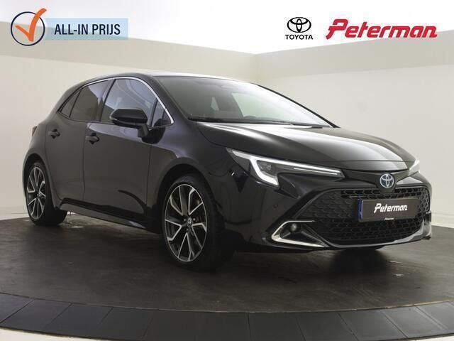 Zwart Gebruikt 2023 Toyota Corolla Hybrid Executive Hatchback | € 31.999 - Afbeelding 1/4