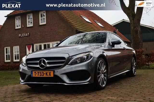 Grijs, metallic lak Gebruikt 2016 Mercedes C220 Prestige Coupé | € 24.945 (Eerlijke prijs) - Afbeelding 1/4