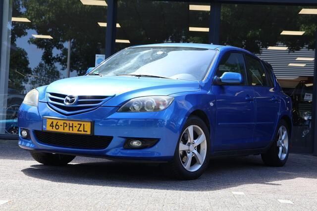 Blauw Gebruikt 2004 Mazda 3 Touring Hatchback | € 1.445 (Eerlijke prijs) - Afbeelding 1/4