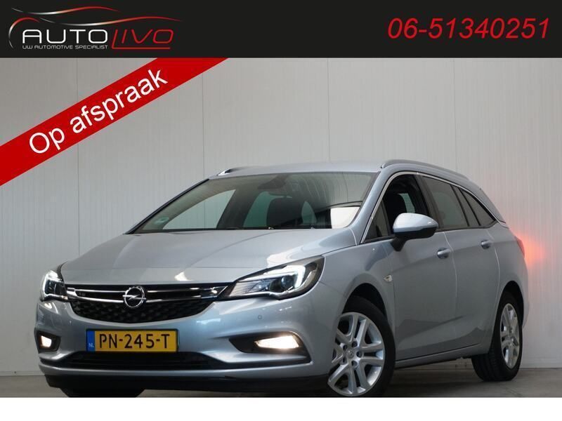 Grijs, metallic lak Gebruikt 2017 Opel Astra Edition Stationwagen | € 12.495 (Iets duurder) - Afbeelding 1/4