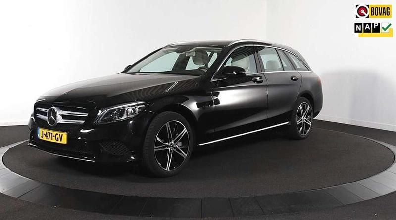 Zwart Gebruikt 2020 Mercedes C300e Business Stationwagen | € 31.950 (Goede deal) - Afbeelding 1/3