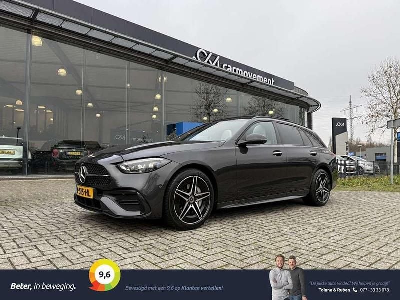 Grijs Gebruikt 2022 Mercedes C300e AMG Line Premium Stationwagen | € 36.950 (Eerlijke prijs) - Afbeelding 1/3