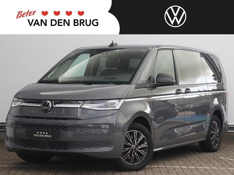 Grijs Gebruikt 2022 VW Multivan Style Van | € 50.950 - Afbeelding 1/3