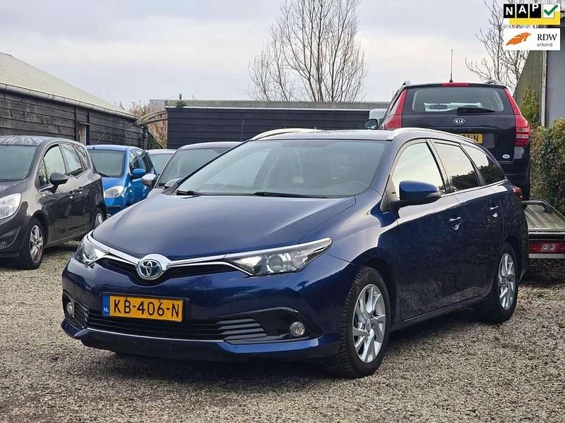 Blauw (metallic) Occasion 2016 Toyota Auris Hybrid Hatchback | € 13.949 (Eerlijke prijs) - Afbeelding 1/4
