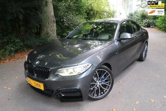 Grijs, metallic lak Gebruikt 2014 BMW M235 Executive Coupé | € 22.950 (Eerlijke prijs) - Afbeelding 1/4